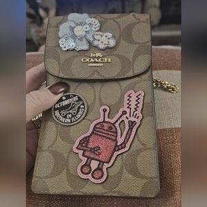 COACH KEITH HARING SIGNATURE CANVAS "PATCHES"  NORTH/SOUTH PHONE/ CROSSBODY 🤎💛